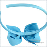 4 Inch bow on solid headbands